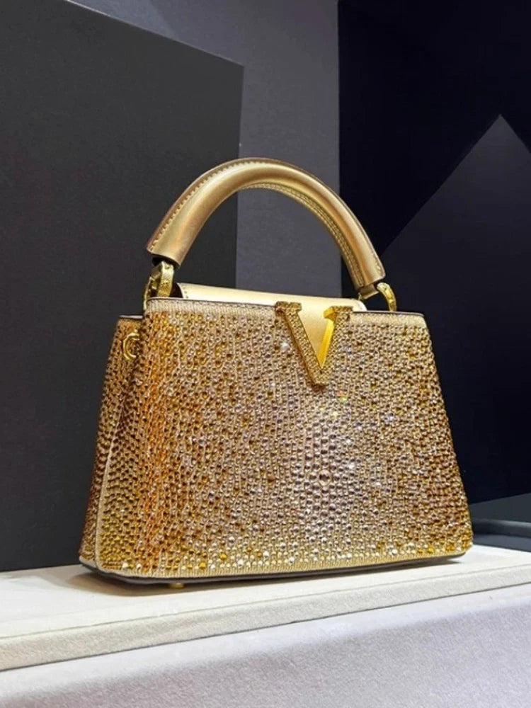 Verzierte Henkeltasche – Gold