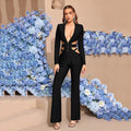 Schwarzer Zweiteiler mit Cut-out-Blazer und weiter Hose